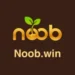 Logo of "Noob.win" featuring the word "noob" in a golden-yellow gradient font with a green sprouting plant growing from the second "o", symbolizing growth or development. The background is dark brown.